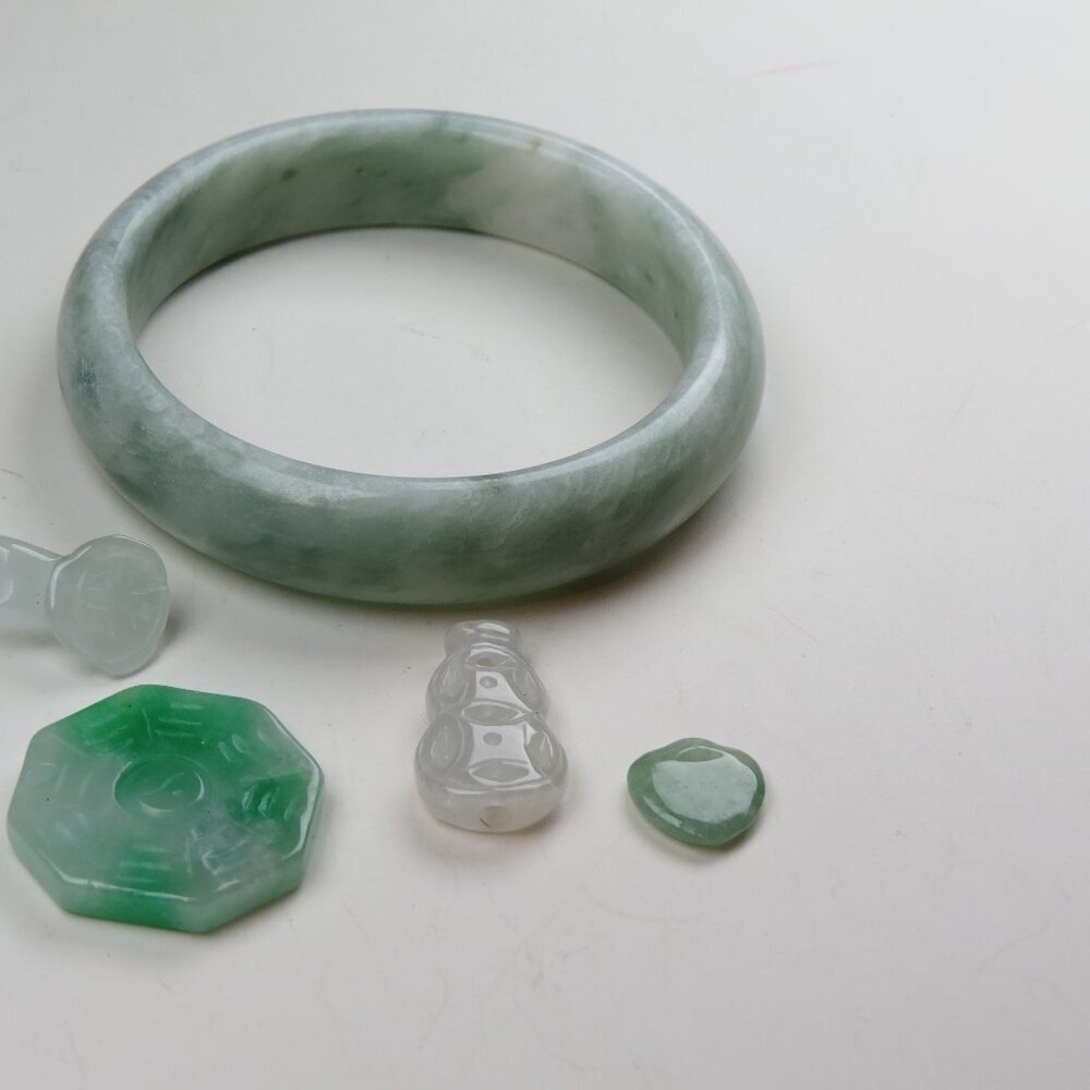 $650 Jade Bangle &  4 carved pendent Lot Sale.